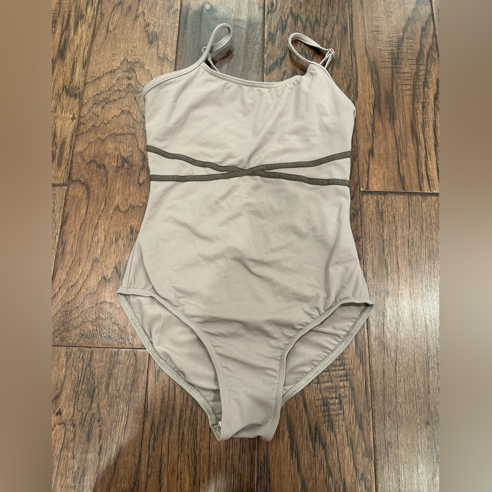 Nikolay leotard in the Camilla Ribbon Front Camisole Leotard in size small.